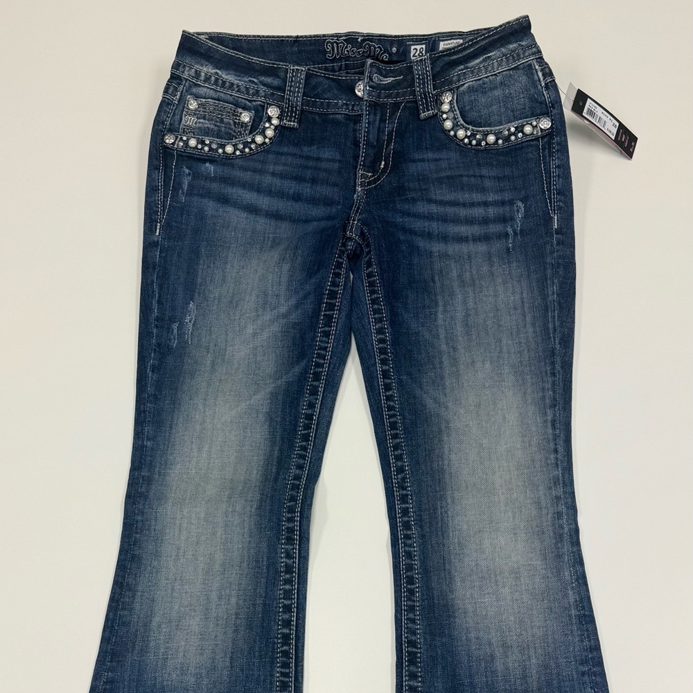 NWT (tag $109) Selling for $90, 
Miss Me Faded Blue Flare Jeans